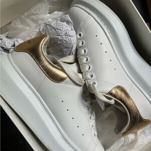 White and Gold Alexander McQueen sneakers